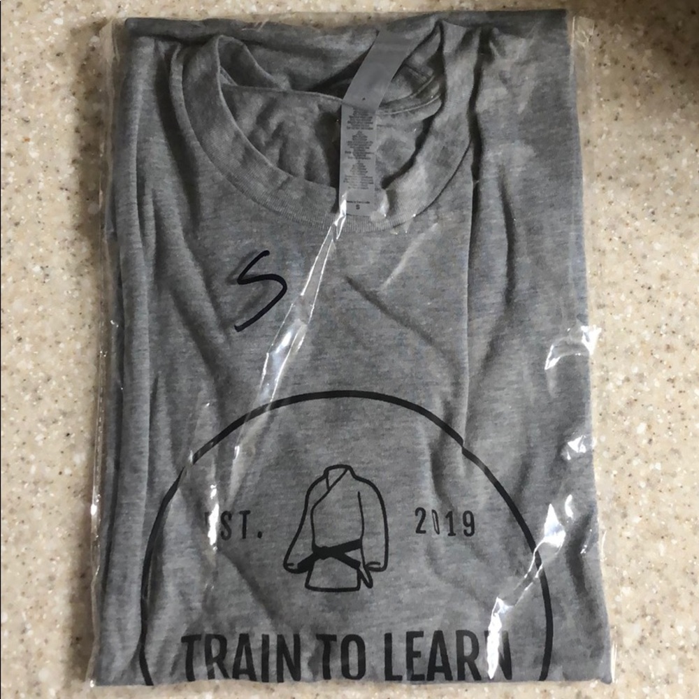 Train to learn apparel™️ T-shirt